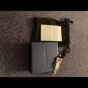 MICHAEL KORS BUCKLE BANGLE BRACELET - like new with original pouch and box